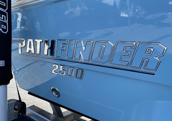 Slide: The Image of 2024 Pathfinder 2500 Hybrid boat logo on blue hull. - 17