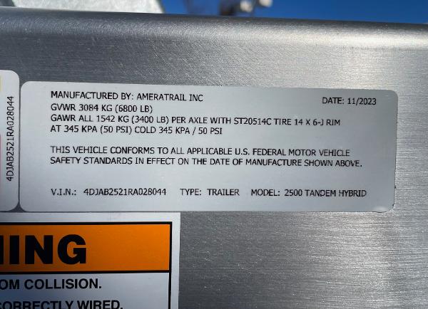 Slide: The Image of 2024 Pathfinder 2500 Hybrid trailer label with specifications and safety standards. - 20