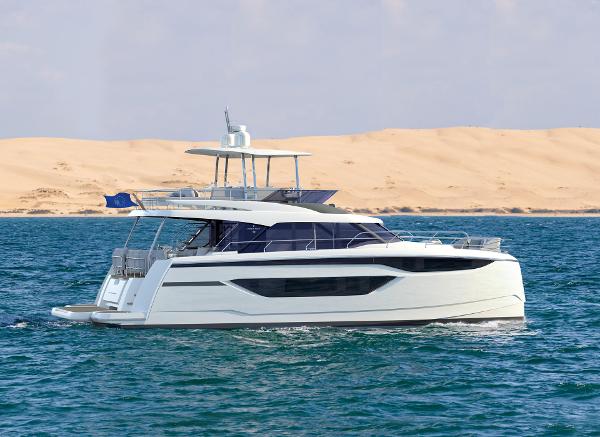 Slide: The Image of 2025 Prestige M48 yacht cruising on the ocean with sandy dunes in the background. - 0