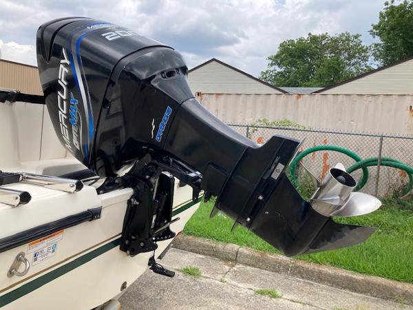 Slide: The Image of 1998 Pursuit 2270 Center Console with Mercury outboard motor. - 9