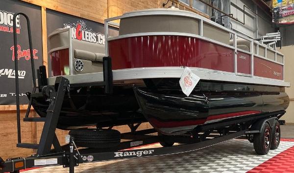 Slide: The Image of 2024 Ranger 200C pontoon boat on trailer in showroom. - 6