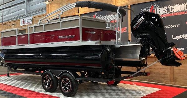 Slide: The Image of 2024 Ranger 200C pontoon boat with Mercury outboard motor on display. - 7