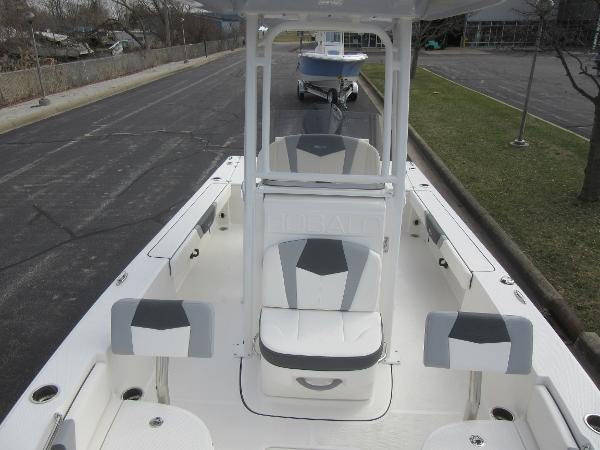 Slide: The Image of 2024 Robalo 226 Cayman boat interior with seating and console. - 12
