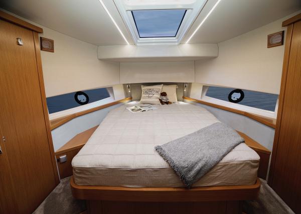 Slide: The Image of Luxurious cabin interior of 2023 Sargo 45 yacht with skylight and cozy bedding. - 10