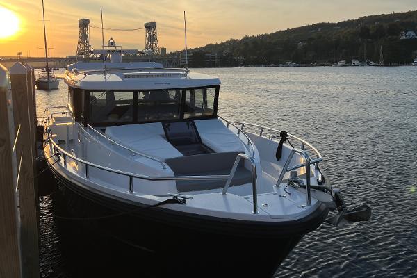 Slide: The Image of Sargo 45 boat docked at sunset, 2023 model. - 27