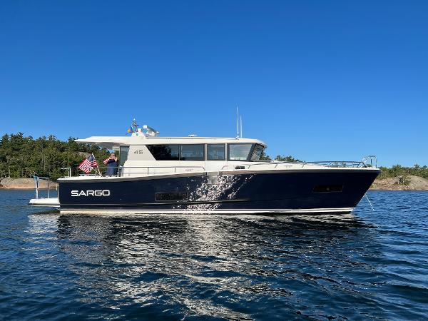 Slide: The Image of 2023 Sargo 45 boat cruising on a sunny day. - 32
