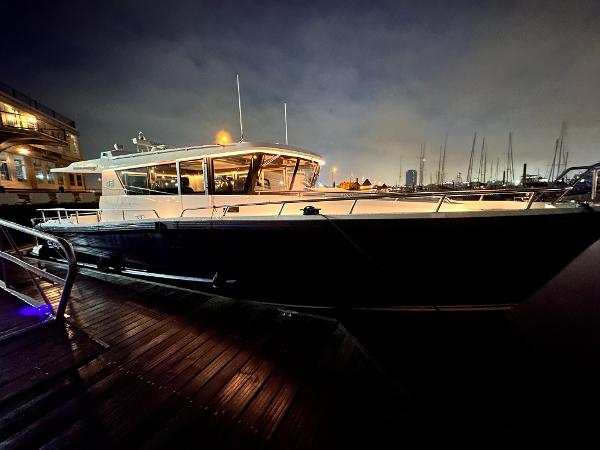 Slide: The Image of Sargo 45 boat docked at night, 2023 model. - 33