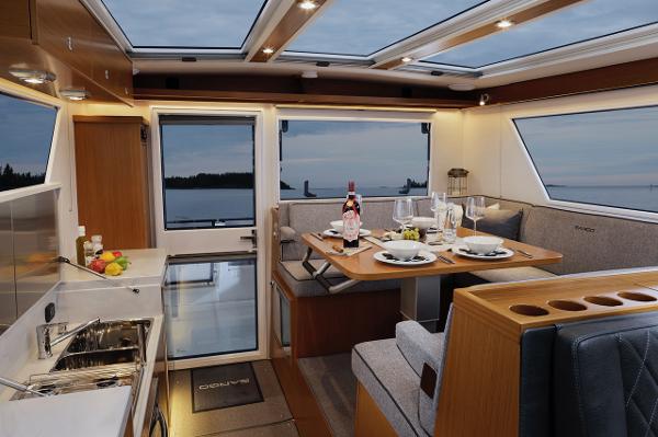 Slide: The Image of Luxurious interior of 2023 Sargo 45 yacht with dining area and kitchen. - 4