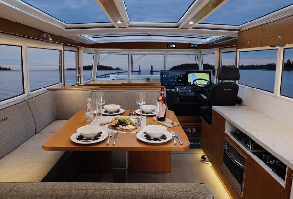 Slide: The Image of Luxurious interior of 2025 Sargo 45 Cat A yacht with dining area and navigation station. - 17