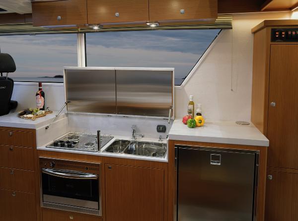 Slide: The Image of Modern kitchen in 2025 Sargo 45 Cat A boat with stainless steel appliances. - 23