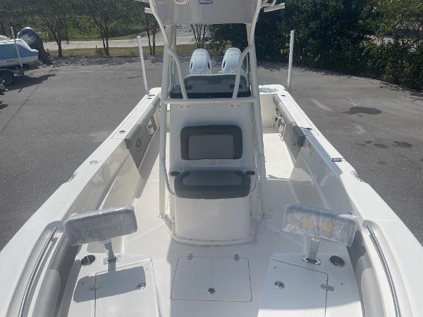 Slide: The Image of 2024 Sea Born LX 24 boat interior with seating and console. - 9