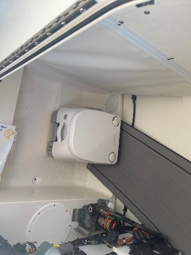 Slide: The Image of 2024 Sea Born LX 24 LE boat interior with portable toilet. - 11