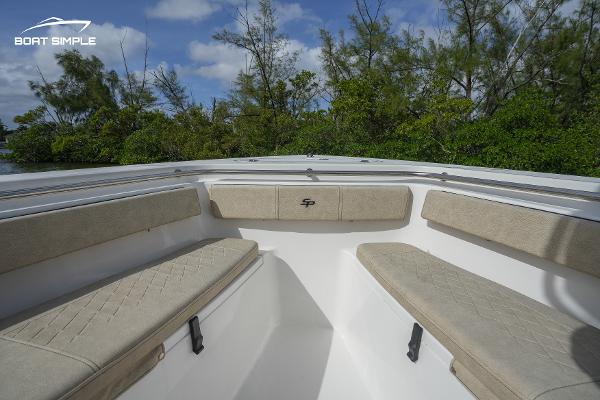 Slide: The Image of 2023 Sea Pro 219 Deep V CC boat interior with cushioned seating. - 6