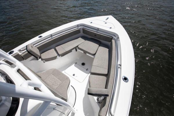 Slide: The Image of 2024 Sea Pro 222 Center Console boat with spacious seating on the water. - 1