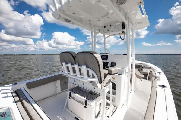 Slide: The Image of 2024 Sea Pro 222 Center Console boat on open water under blue sky. - 7