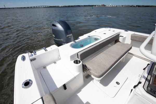 Slide: The Image of 2024 Sea Pro 222 Center Console boat with Yamaha 200 outboard motor on water. - 9