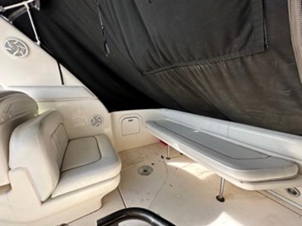 Slide: The Image of Interior seating area of a 1998 Sea Ray 290 Sundancer boat. - 11