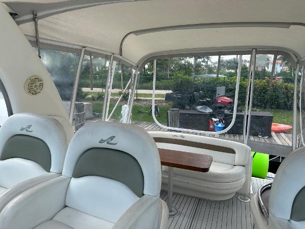 Slide: The Image of Interior of a 2006 Sea Ray 340 Sundancer boat with seating and table. - 33