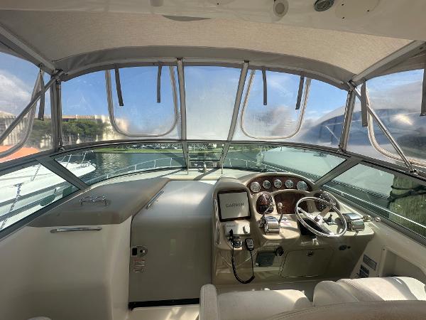 Slide: The Image of 2006 Sea Ray 340 Sundancer helm with Garmin navigation system. - 35