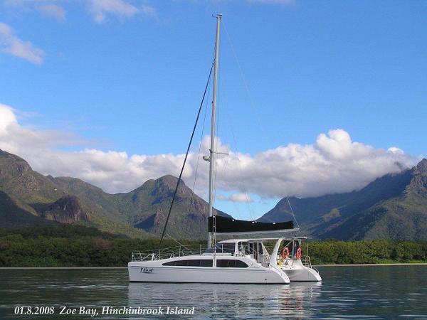 Slide: The Image of 2024 Seawind 1160 Lite catamaran sailing in Zoe Bay, Hinchinbrook Island. - 11