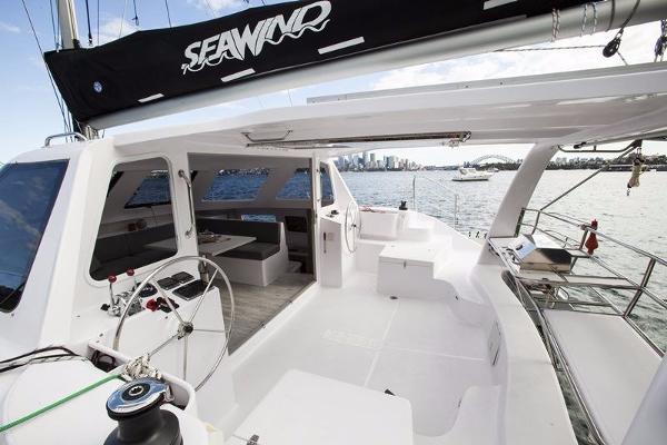 Slide: The Image of 2024 Seawind 1160 Lite catamaran with spacious cockpit and modern design. - 17