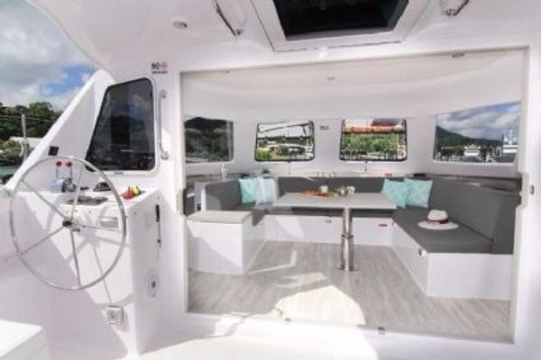 Slide: The Image of Seawind 1160 Lite 2024 model interior with spacious seating and modern design. - 21