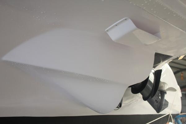 Slide: The Image of 2024 Seawind 1160 Lite catamaran hull and propeller detail. - 29