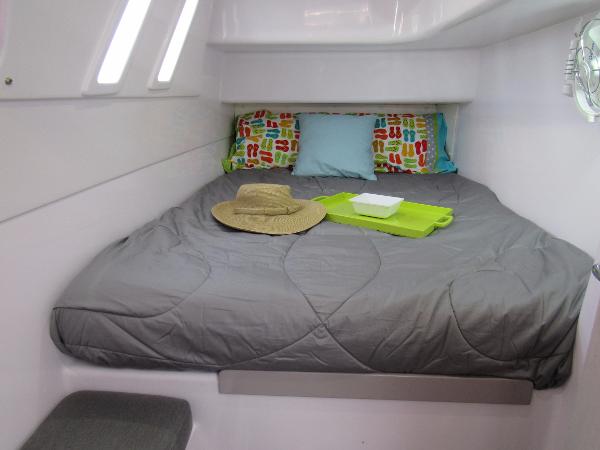 Slide: The Image of Cozy cabin interior of 2024 Seawind 1160 Lite with bed and hat. - 43