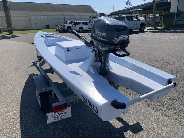 Slide: The Image of 2023 Solo Skiff 14 with Yamaha outboard motor on trailer. - 1
