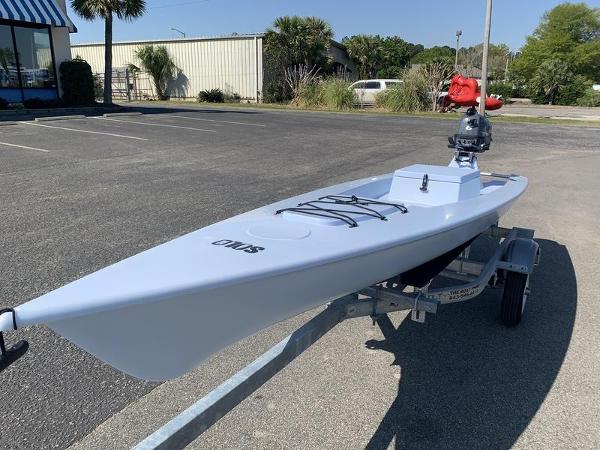 Slide: The Image of 2023 Solo Skiff 14 on a trailer in a parking lot. - 6