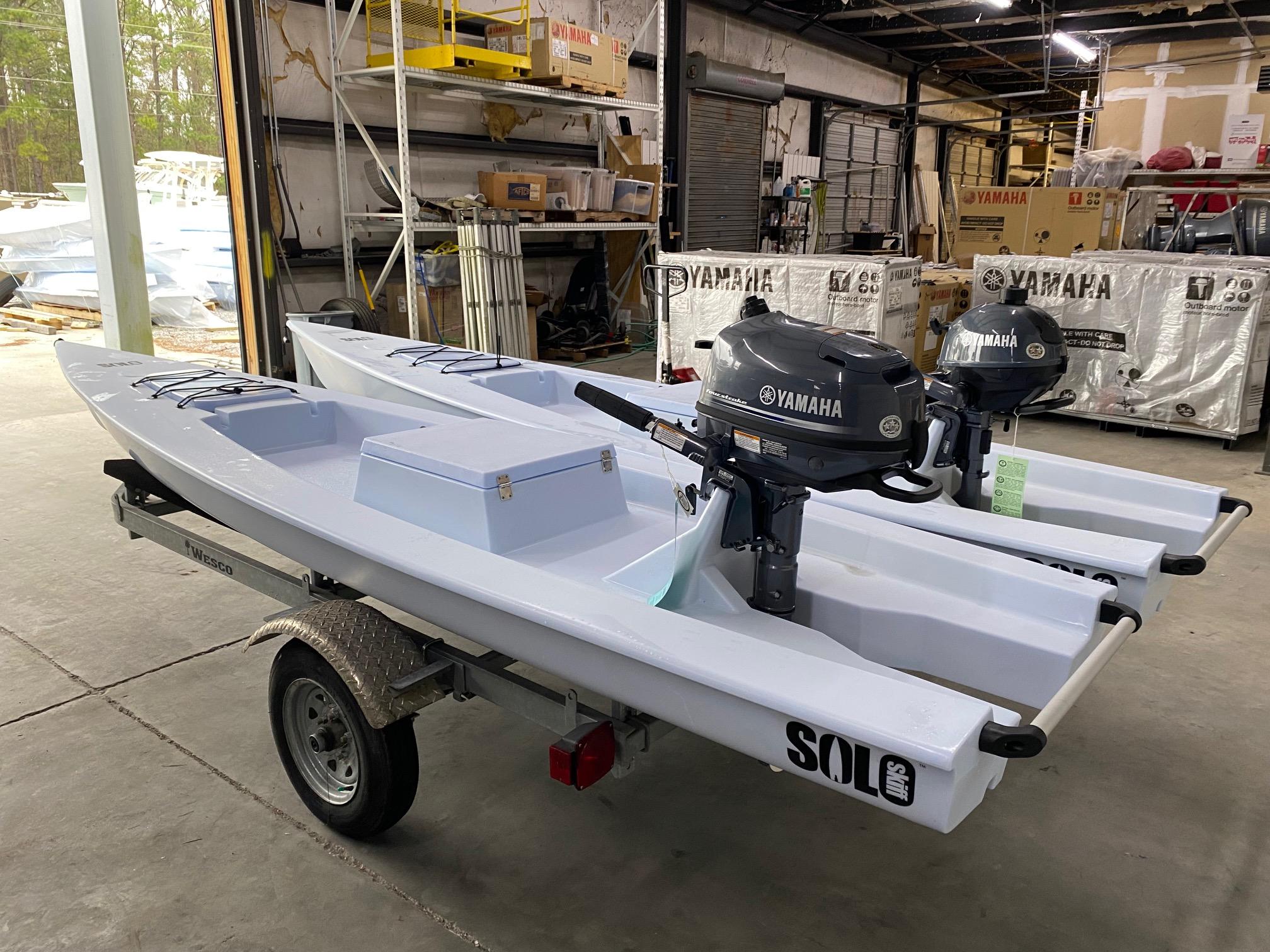 Slide: The Image of 2023 Solo Skiff boats with Yamaha motors in a warehouse. - 7