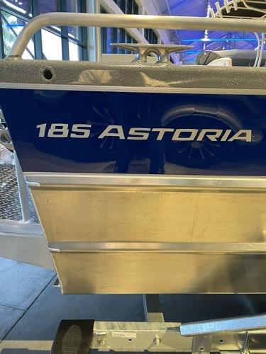Slide: The Image of 2024 Spartan 185 Astoria boat exterior with blue and silver detailing. - 1