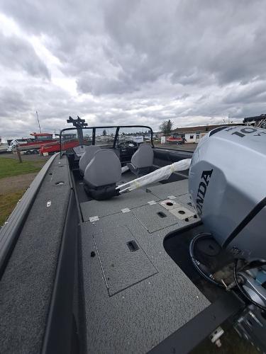 Slide: The Image of 2022 Starweld 19'FLEX DC boat with Honda outboard motor, interior view. - 3