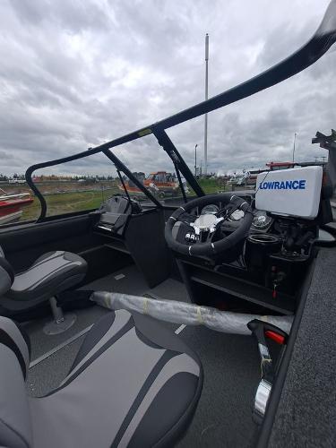 Slide: The Image of 2022 Starweld 19'FLEX DC boat interior with Lowrance navigation system. - 4