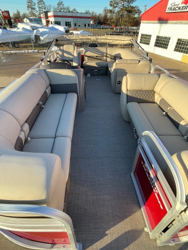 Slide: The Image of 2024 Sun Tracker Party Barge 20 DLX pontoon boat with spacious seating and modern design. - 1