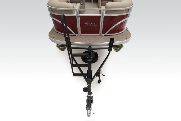 Slide: The Image of 2024 Sun Tracker Party Barge 20 DLX pontoon boat rear view on trailer. - 13