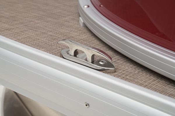 Slide: The Image of 2024 Sun Tracker Party Barge 20 DLX deck cleat and railing detail. - 16