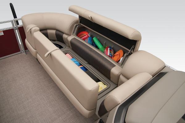 Slide: The Image of 2024 Sun Tracker Party Barge 20 DLX storage compartments with various items. - 29