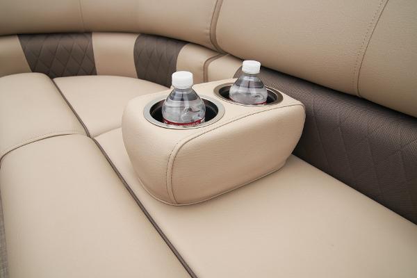 Slide: The Image of 2024 Sun Tracker Party Barge 20 DLX seating with built-in cup holders. - 30