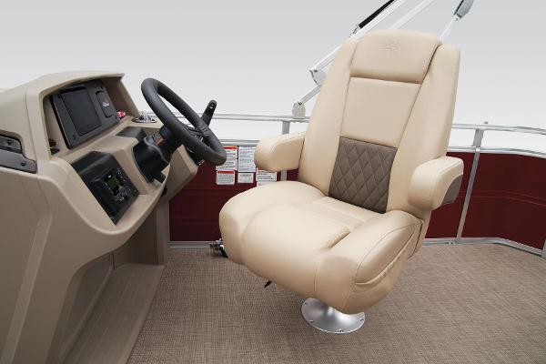 Slide: The Image of 2024 Sun Tracker Party Barge 20 DLX captain's chair and helm station. - 34