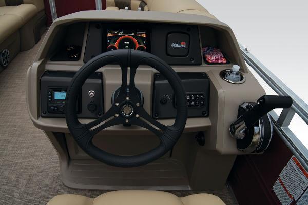 Slide: The Image of 2024 Sun Tracker Party Barge 20 DLX helm with steering wheel and control panel. - 37