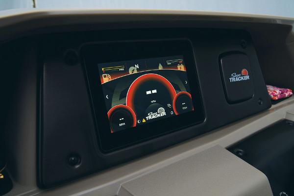 Slide: The Image of 2024 Sun Tracker Party Barge 20 DLX dashboard with digital display and controls. - 38
