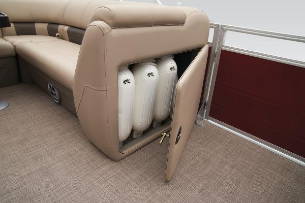 Slide: The Image of Sun Tracker Party Barge 20 DLX 2024 storage compartment with fenders. - 42
