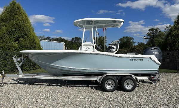 Slide: The Image of 2024 Tidewater 210 CC Adventure boat on a trailer. - 0