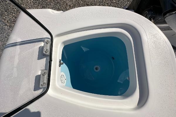 Slide: The Image of Livewell on the 2024 Tidewater 210 CC Adventure boat. - 43