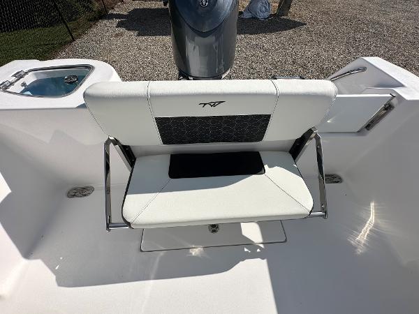 Slide: The Image of 2024 Tidewater 210 CC Adventure boat seating and motor. - 45