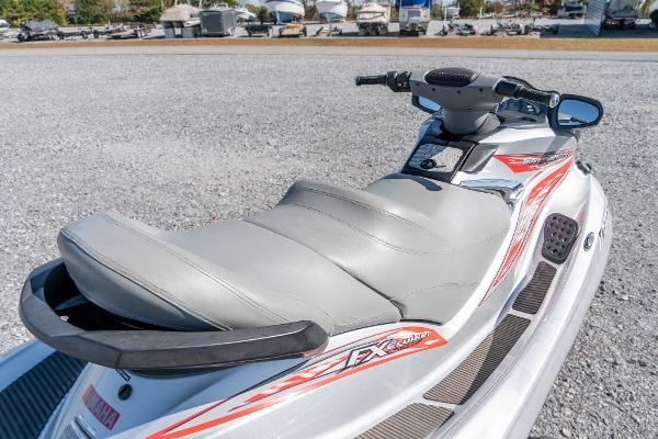 Slide: The Image of 2007 Yamaha WaveRunner FX Cruiser HO jet ski with gray seat and red accents. - 5