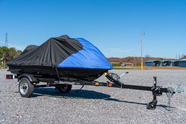 Slide: The Image of 2007 Yamaha WaveRunner FX Cruiser HO on trailer with black and blue cover. - 9