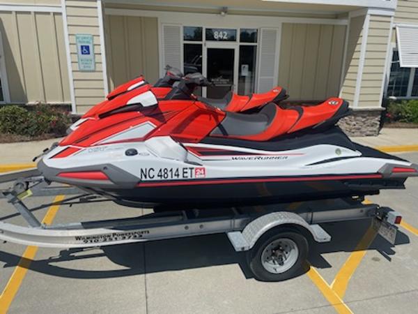 Slide: The Image of 2021 Yamaha WaveRunner VX Cruiser on trailer, parked outside a building. - 1
