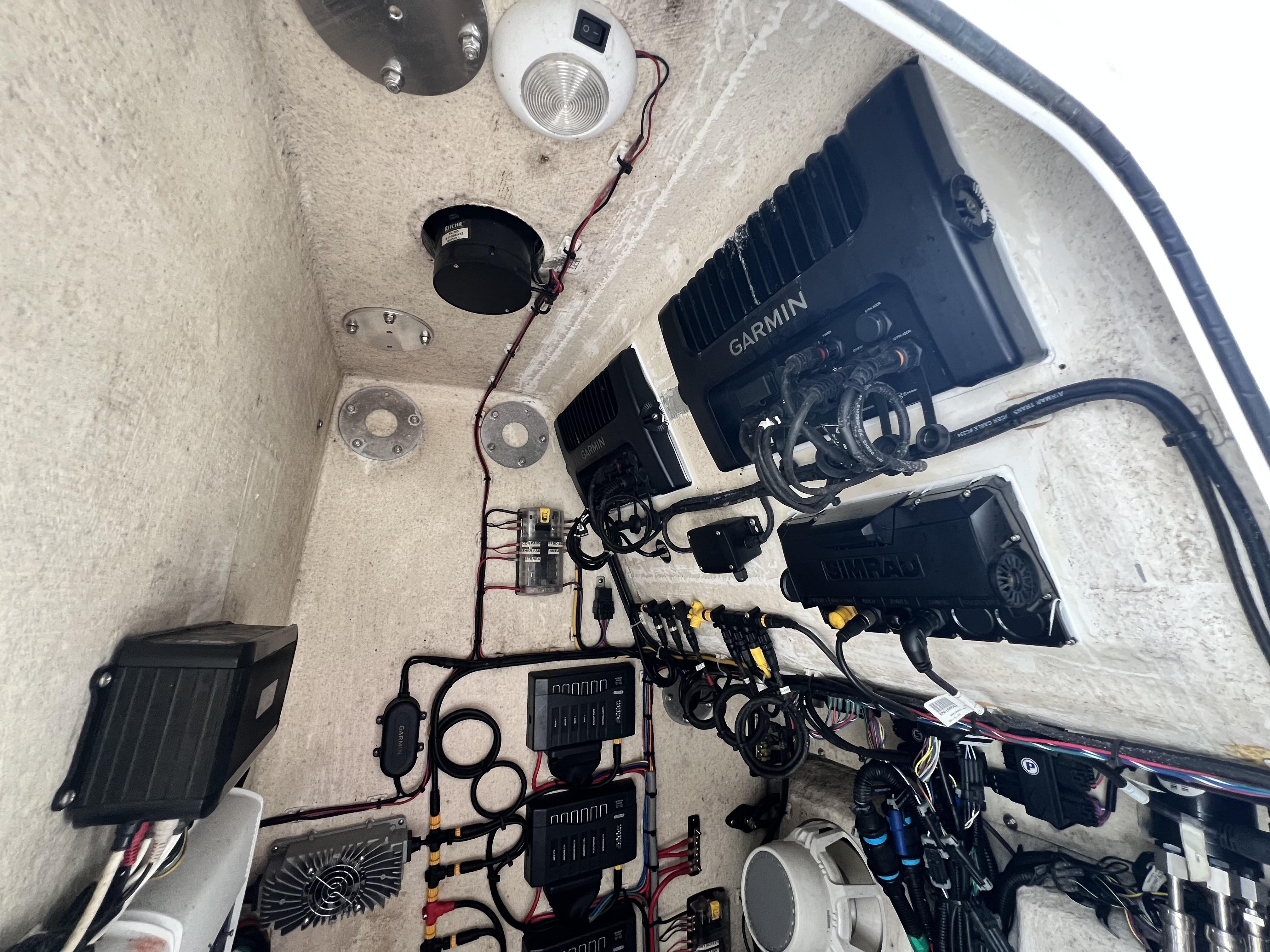 Slide: The Image of Electrical and navigation systems inside a 2018 Yellowfin 29 boat. - 34